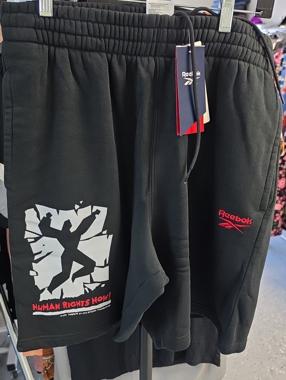 Reebok Black Shorts with White Graphic and Red Logo